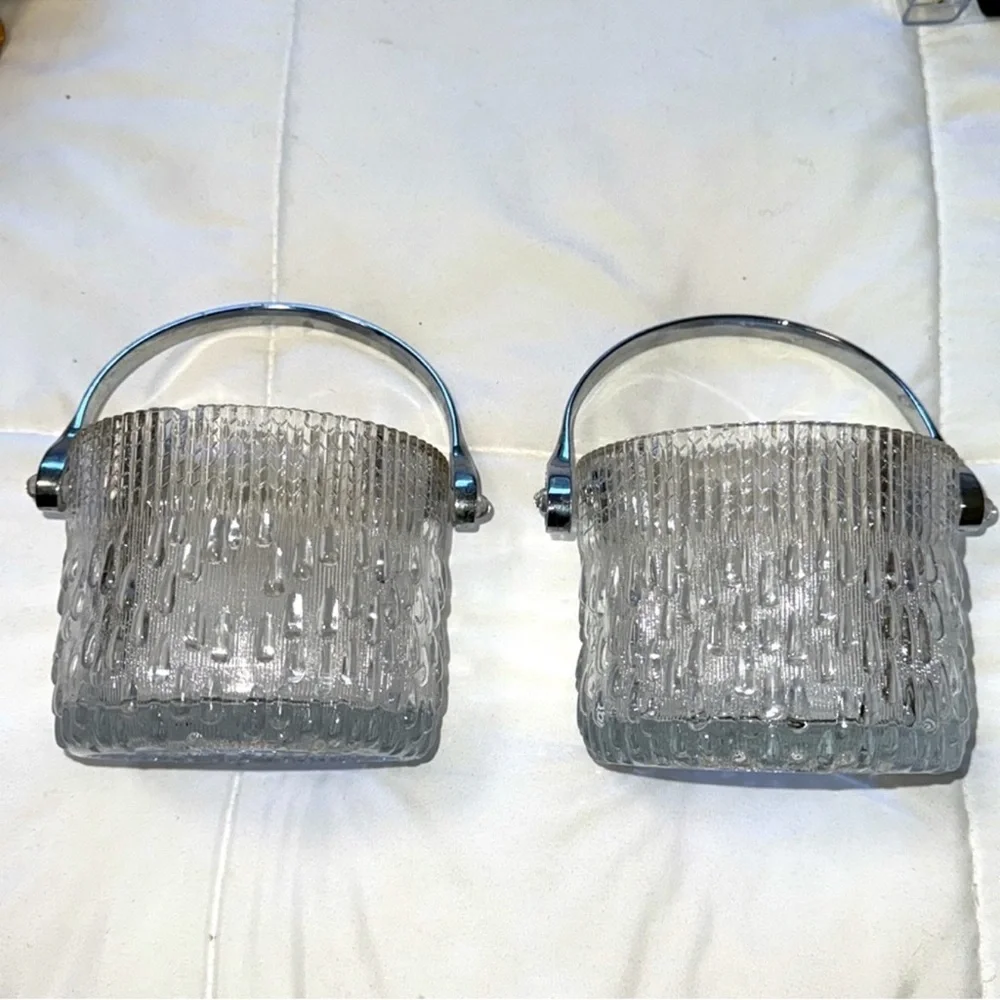 Set of two texture glass ice buckets or votive holders with chrome handles. 2